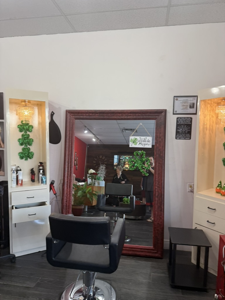 Salon Rouge II ornate gold mirror and chandelier detail