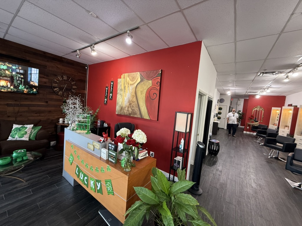 Salon Rouge II — signature artwork and warm red interiors